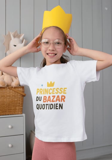 a little girl wearing a princess outfit and a crown