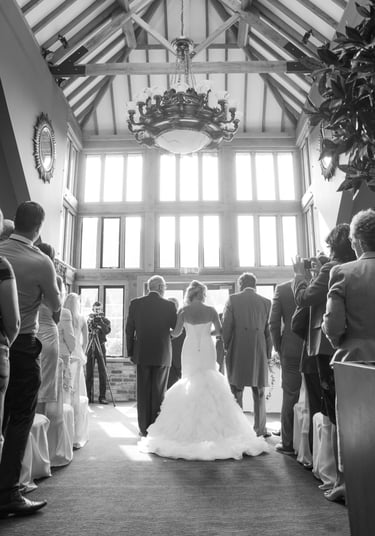 bride and groom at the alter