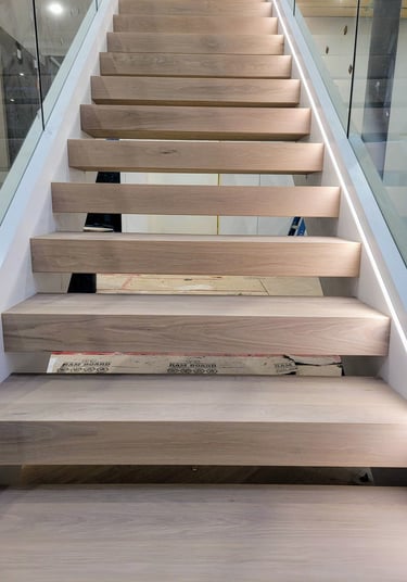 Custom stair treads as part of a premium staircase design, built for style and durability