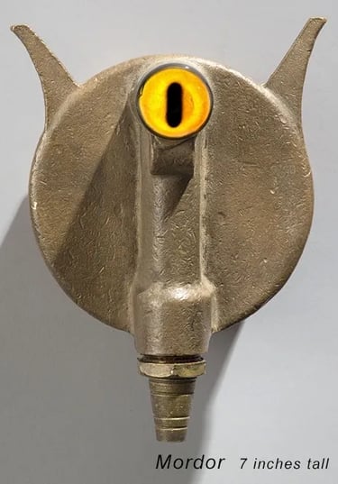 Found object one-eyed robot head built by Santa Barbara artist Tal Avitzur.