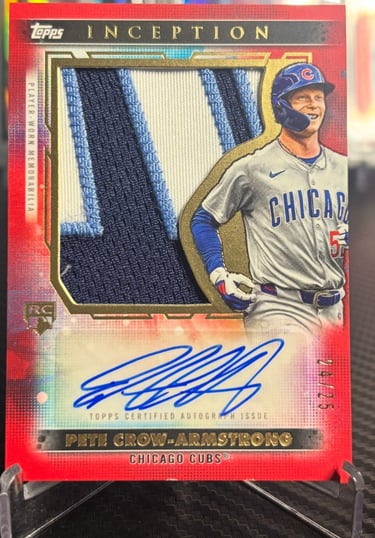 "PCA rookie autograph patch card featuring a player’s on-card signature and multi-textured fabric pa