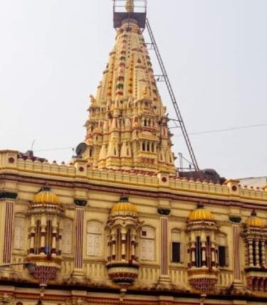 a large building with a tower with a clock on it