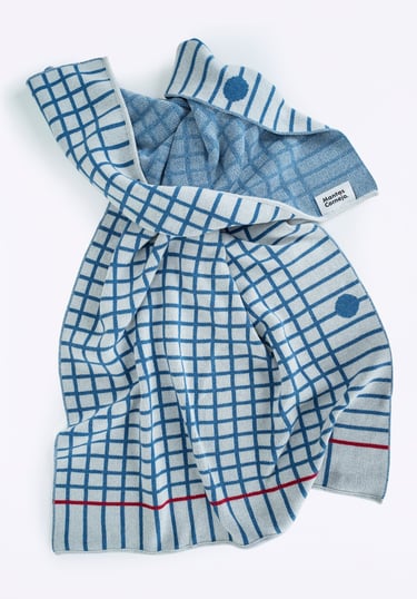a blanket with a geometric pattern