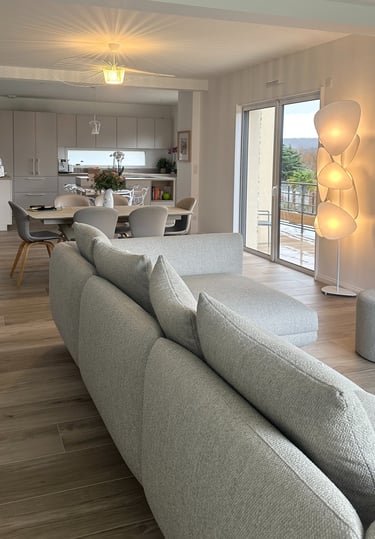 a living room with a couch and a table