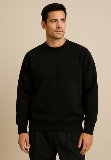 a man in a black sweater and pants