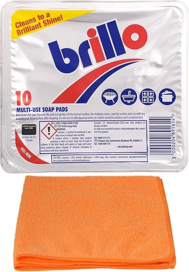 Pack of 10 Brillo multi-use steel wool soap pads for cleaning with an orange microfiber cloth.