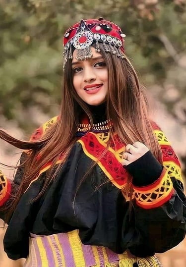 a woman in a colorful dress and a colorful hat