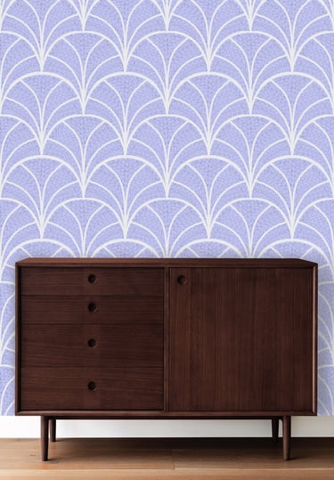 a cabinet with pastel wallpaper