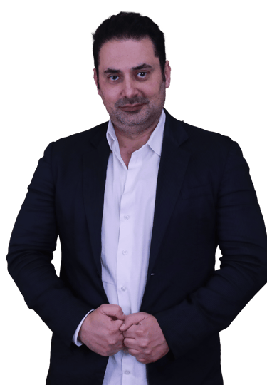 a man in a suit and white shirt nidal nasrallah trainer public speaking