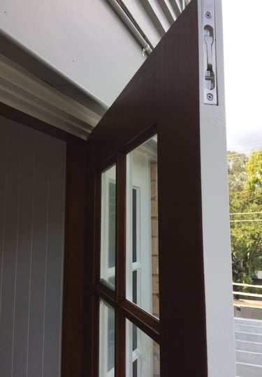 Ashgrove residence timber door and window staining by PJCPainters