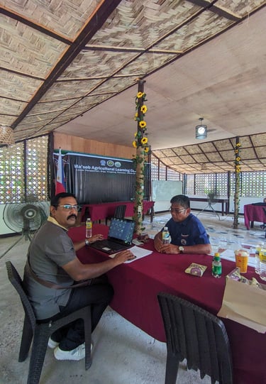 "Social and environmental field researchers conducting Key Informant Interviews for ESIA" 