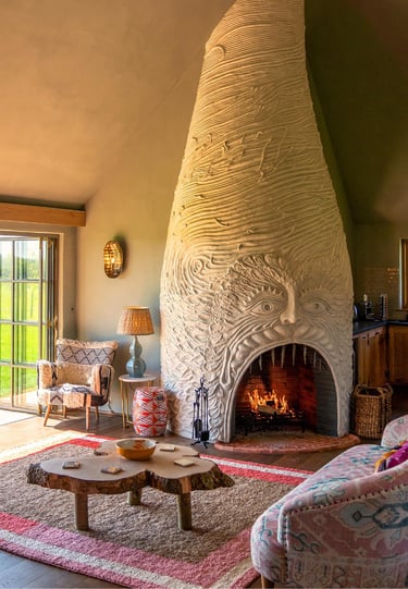 wilderness reserve, suffolk, hotel room with a fire place