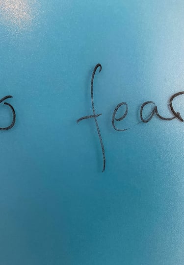 a no fear written on a blue background