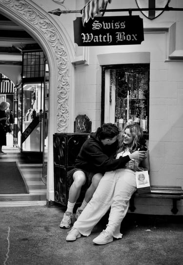 Young lovers on a bench in London Court, Perth by street photographer Peter Pickering