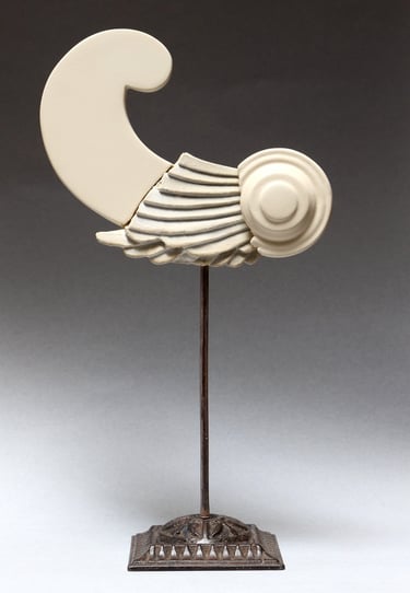 Very small ceramic sculpture variation of fragmented, reconstructed Greek Archaic-style wing.