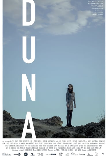 a woman standing on a hill with a blue sky in the background, dany campos, film, spain, Duna