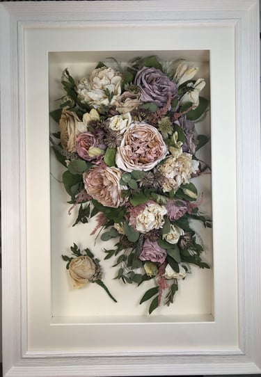 softy pinky purple trailing view preserved wedding bouquet in a frame