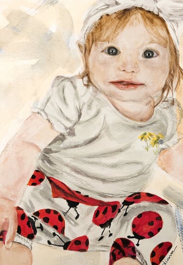 a painting of a baby's face wearing ladybug pants