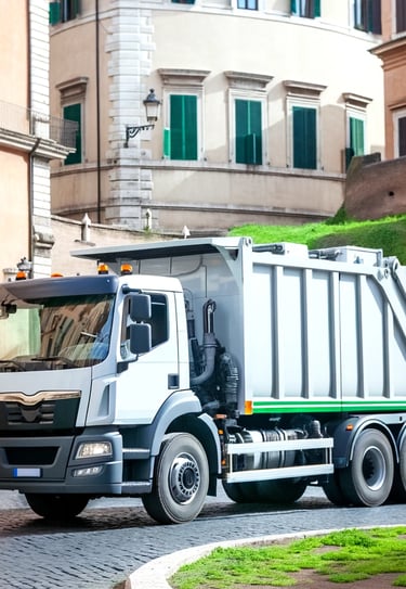 camion che sta svolgendo un operazione di smaltimento rifiuti a roma