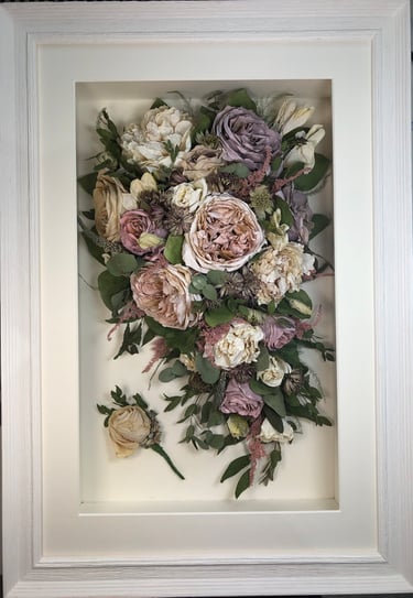 softy pinky purple trailing view preserved wedding bouquet in a frame