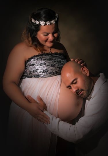 a man and woman in a white dress