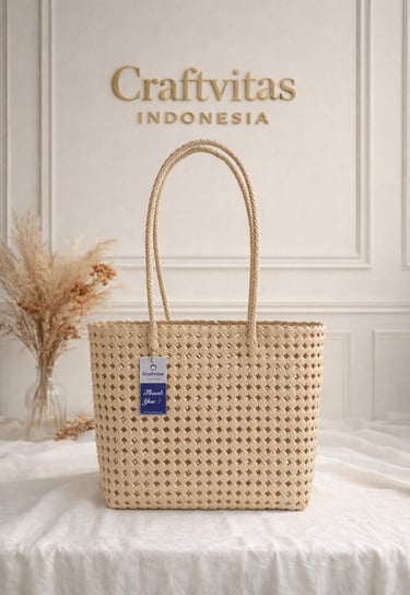 Handmade woven plastic tote bag Sekar series in cream color by Craftvitas Indonesia, eco friendly artisan handbag