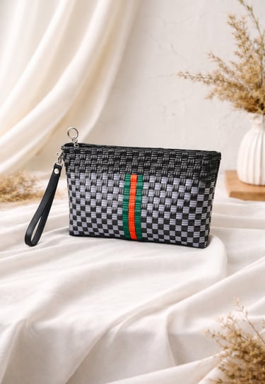 Handmade woven plastic clutch bag black and grey with green red stripe accent by Craftvitas Indonesia