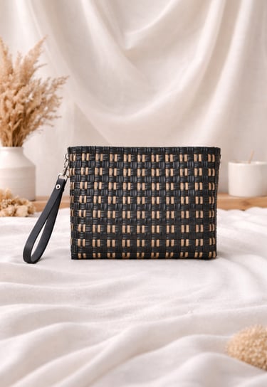 Black and gold checkered woven plastic clutch bag handmade by Craftvitas Indonesia