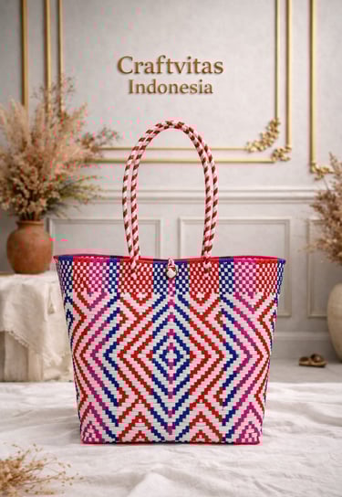 Handmade plastic woven tote bag featuring Indonesian batik diamond pattern in red blue and white