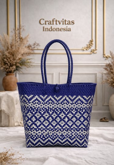 Handwoven plastic tote bag with Indonesian ethnic batik pattern in blue and white, sustainable handmade bag
