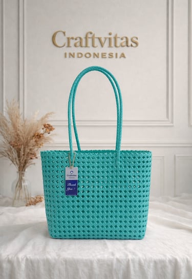 Turquoise handmade woven plastic tote bag Sekar series, eco friendly recycled artisan handbag