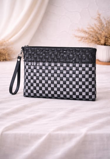 Black and grey checkered woven plastic clutch bag handmade in Indonesia