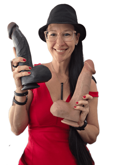Pleasurelit Patricia holding the Black mamba dildo and another for a review