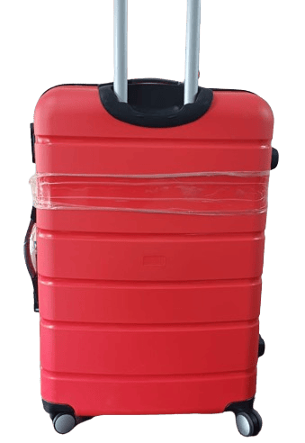 a red fiber suitcase trolley with black handle 