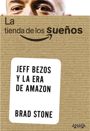 a man holding a box with a sign that says jeff bezos