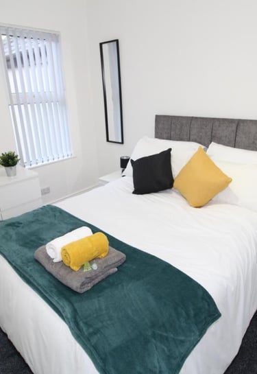 Double bedroom with white walls