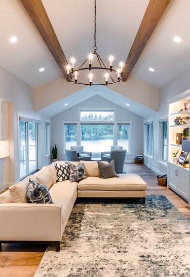 Gorgeous open living room with wood beams