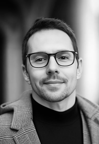 portrait man in a suit and glasses