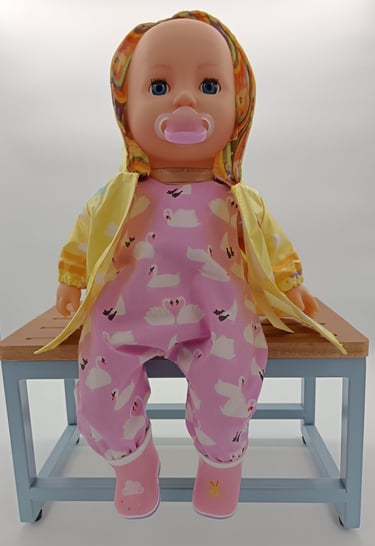 Zapf Baby Annabell Mia wearing Baby Born raincoat and wellies