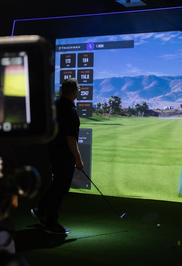 An indoor golf simulator bay