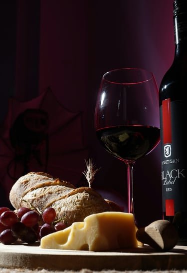red_wine_with_cheese_grapes_bread_plate