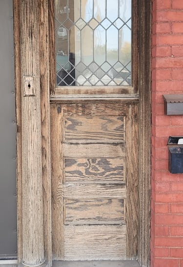 American Painting Specialist Fort Wayne, Indiana refreshing old wood doors to 'like new'.