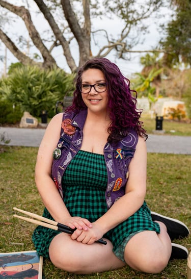 Self portrait, purple hair, smiling, green dress, purple vest