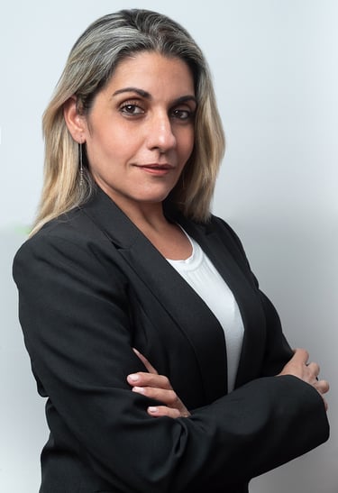 a woman in a black suit and white shirt