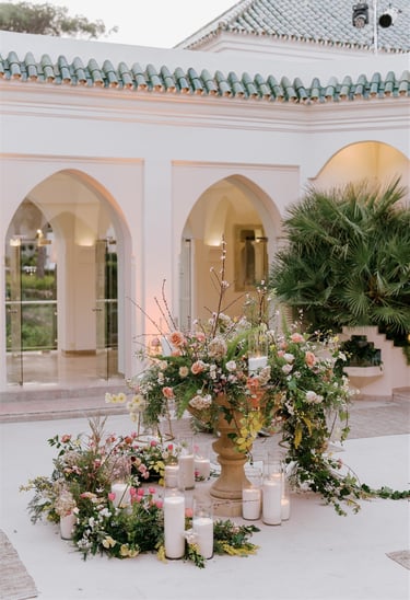 Outdoor dining area at Villa El Rincon in Marbella, with beautiful decorations for a Mediterranean destination wedding.