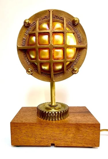 Custom light made from brass underwater cage.