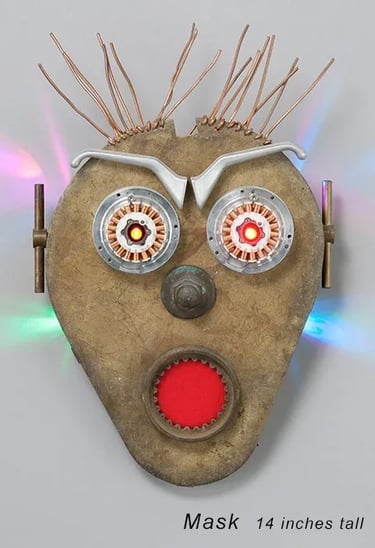 Found object robot head with surprised look built by artist Tal Avitzur.