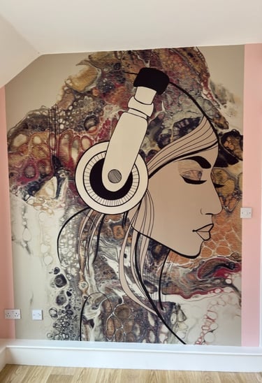 Feature wall wallpaper installation with bespoke mural and wood flooring in a Brighton home