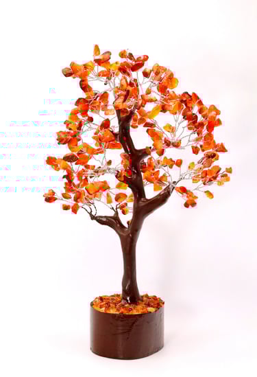 a tree with a brown tree in the middle of it