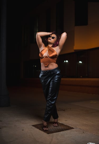 a woman in a leather topperfg topperfg